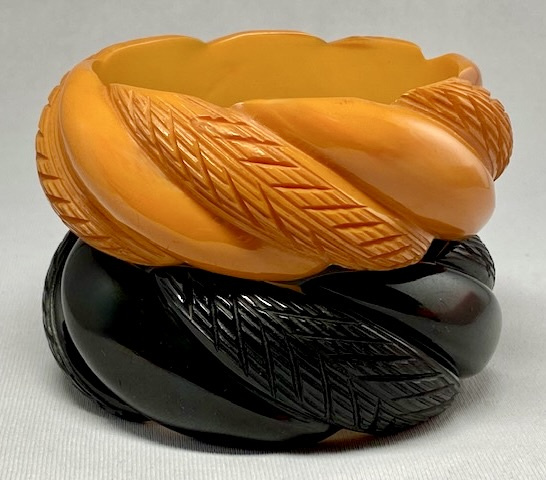 BB143 pr wide & chunky black & maize rope carved bakelite bangles